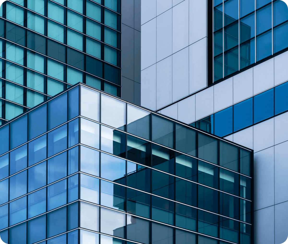 Modern glass and steel building facade.